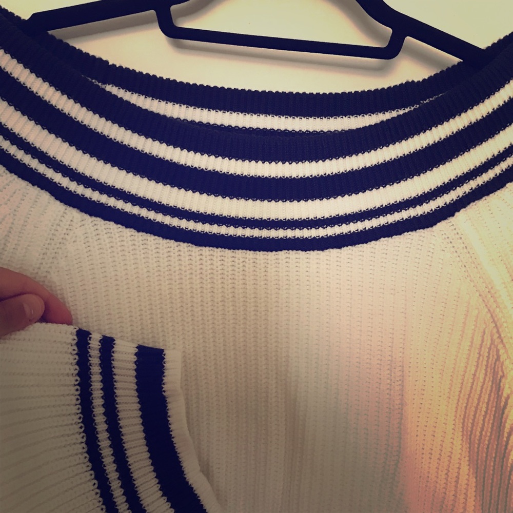 blue striped oversized sweater.